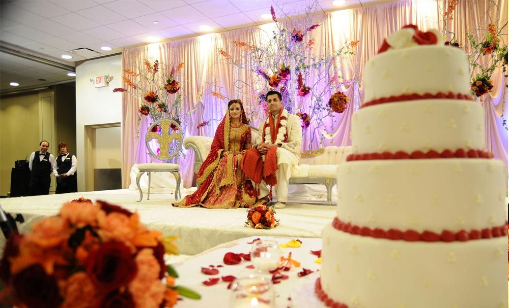 Bride and groom seated at their wedding reception
